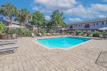 Two swimming pools with relaxed seating